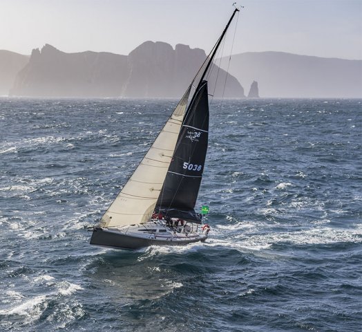 Cinquante reefed down in the Rolex Sydney Hobart. Photo by Carlo Borlenghi / Rolex