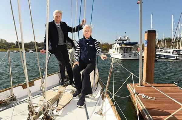 Buckler's Hard Yacht Harbour - Lord Montagu and the Hon. Mary Montagu-Scott on board Gipsy Moth IV
