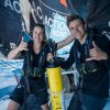 Day 11 onboard Team Malizia. Preparing the weather buoy. Rosalin Kuiper and Will Harris.