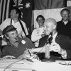 COURAGEOUS skipper, Ted Turner, shaking hands with Bill Ficker