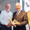 Left to right: Yannick Moreau, the Mayor of Les Sables d'Olonne; Don McIntyre, presenting Sir Chay Blyth, first man to sail solo non-stop west-about around the globe with his scroll and award; Ash Manton, chairman of IACH